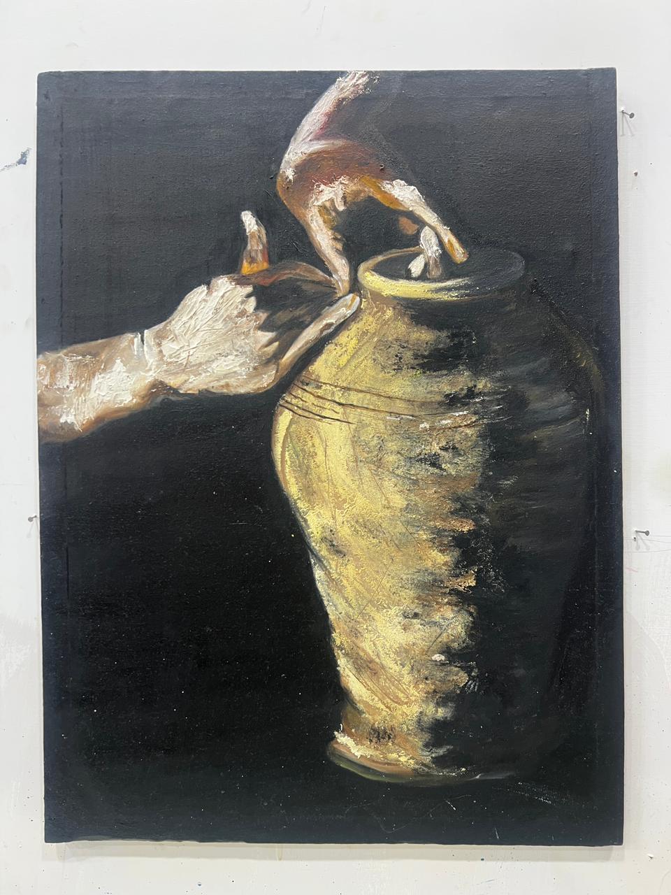The Potter’s Hand: A Textured Study in Gold and Shadow